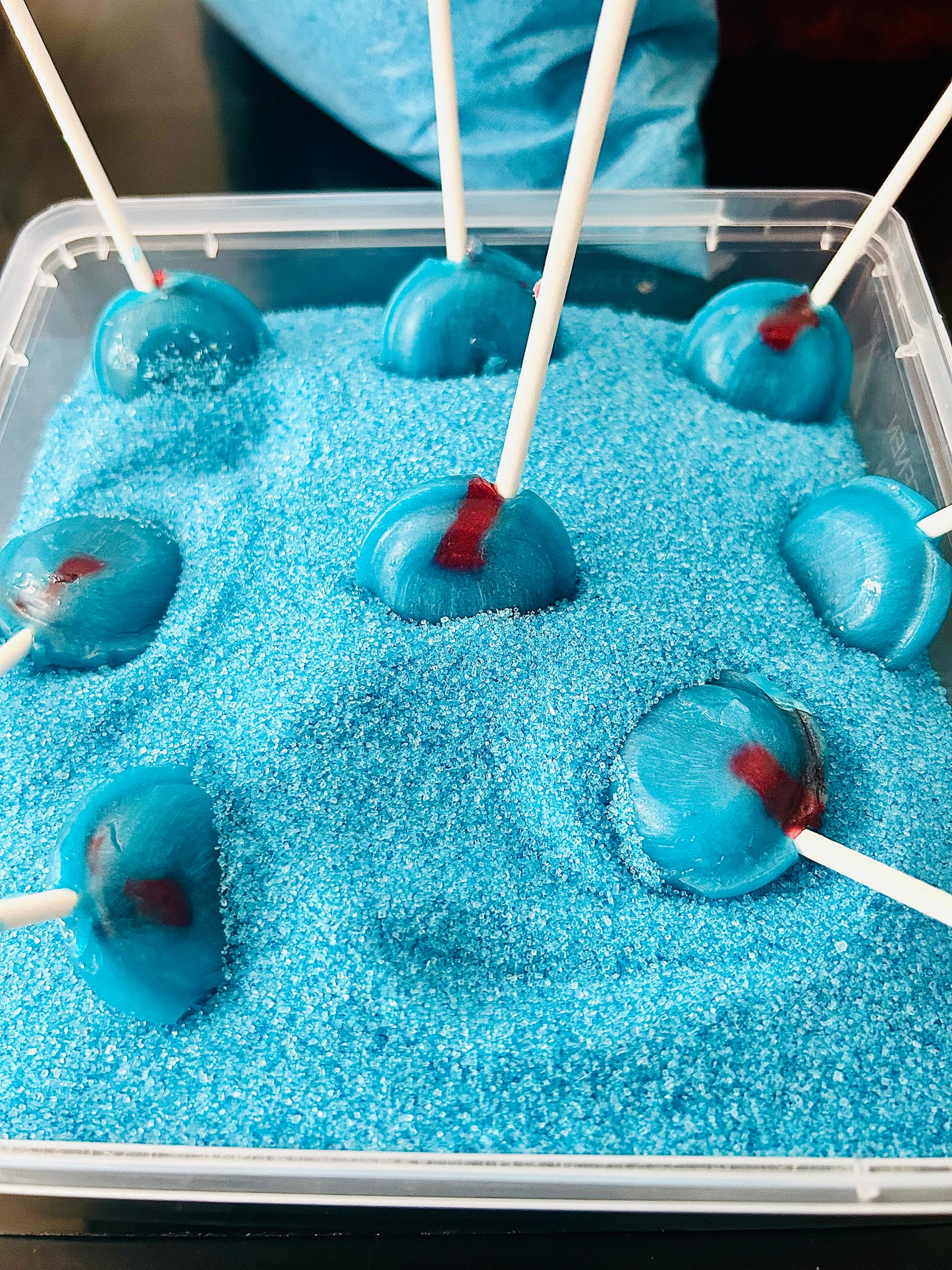 Raspberry flavoured blue sugar crystals